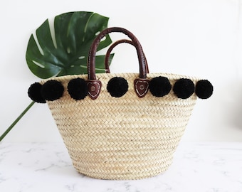 Hand made woven Moroccan Basket tote with black pom poms