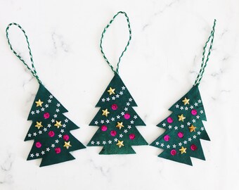 Three leather Christmas tree decorations