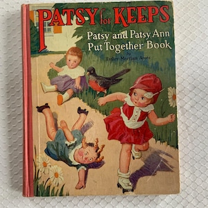 May include: Vintage children's book titled "Patsy for Keeps." The cover features illustrations of two young girls, a bird, and the text "Patsy and Patsy Ann Put Together Book" by Esther Merriam Ames. The book has a red spine.