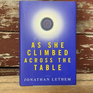1997 First Edition As She Climbed Across the Table Sci-Fi Humor Collectible Book