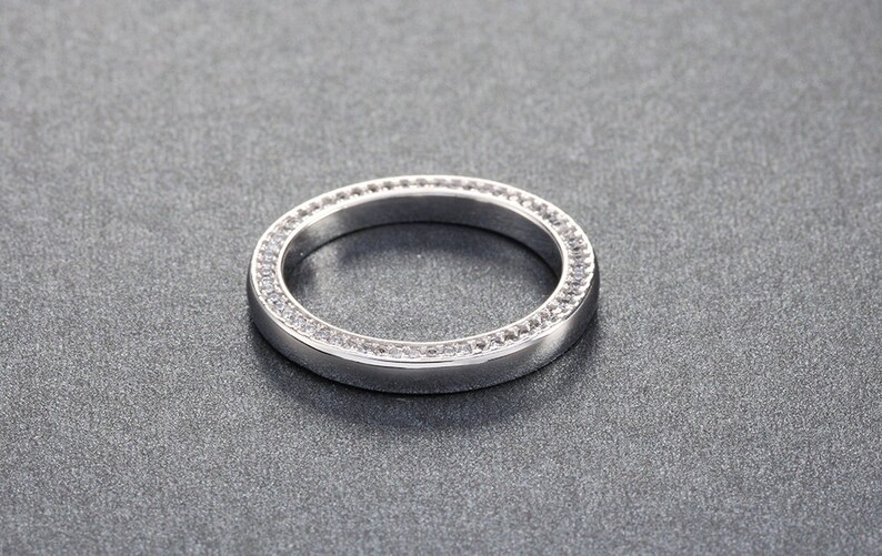 Ring copper plated with zircons