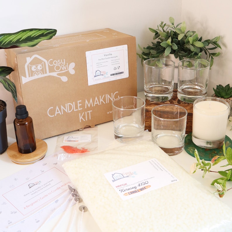 May include: A candle making kit with a brown box that says "Cosy Owl Candle Making Kit" and "Vanilla Soy Wax Candle Making Kit". The kit includes soy wax, wicks, glass jars, essential oil, and instructions.