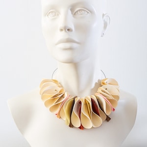 Latex necklace on a steel tire / latex accessory
