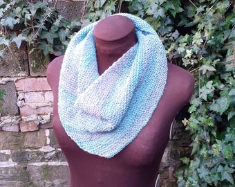 Hand spun 100% corriedale wool, hand dyed, hand knit asymmetric triangle scarf in purple and green.