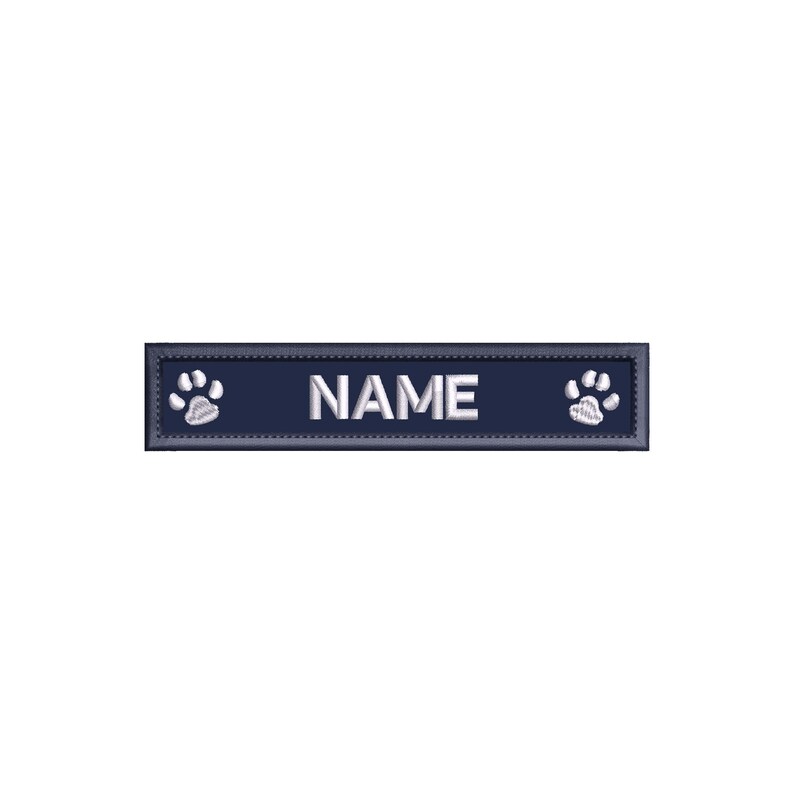May include: A navy blue rectangular dog tag with white paw prints on either side and the word "NAME" in white text.