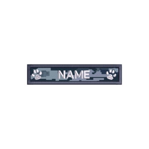 May include: A blue and gray camouflage dog tag with a white paw print on each end and the word "NAME" in white.