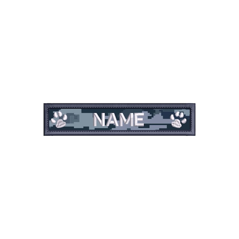 May include: A blue and gray camouflage dog tag with a white paw print on each end and the word "NAME" in white.