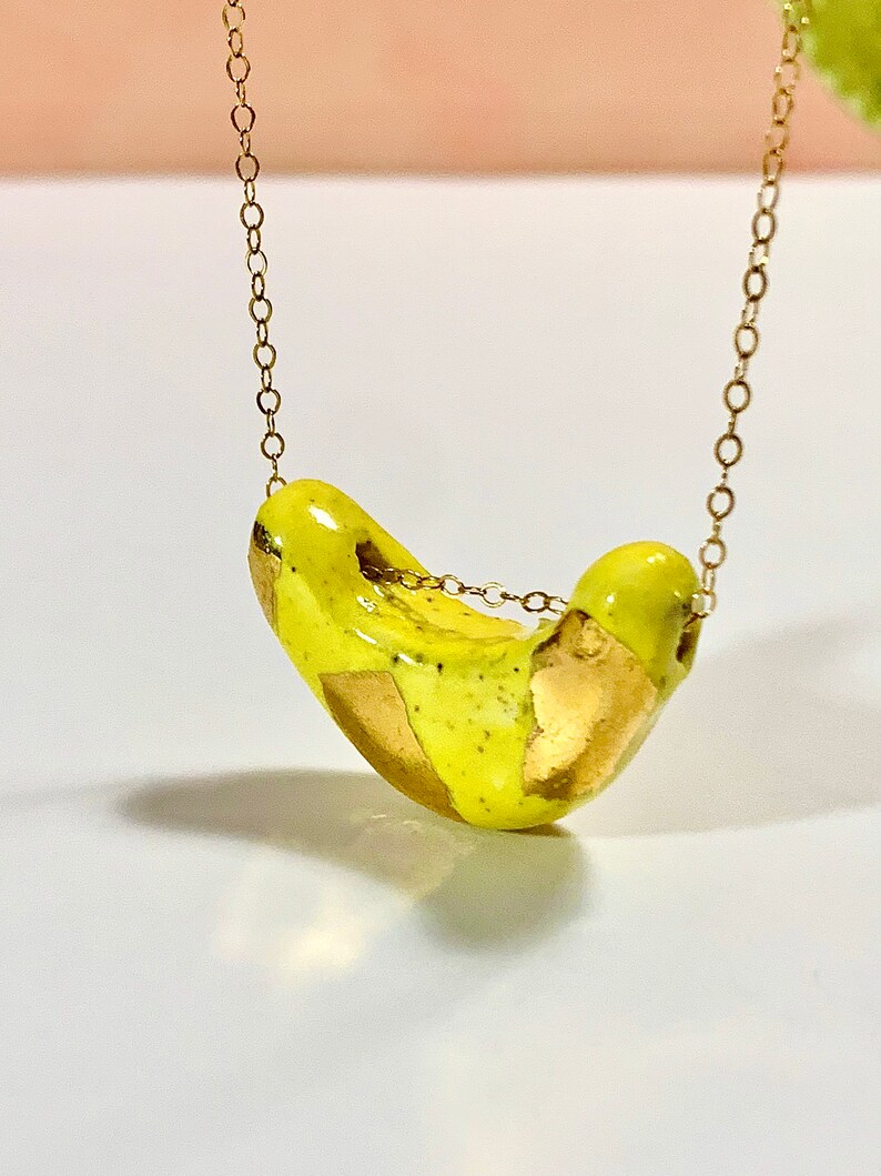 Handmade Ceramic Pendant with 18k Yellow Gold Luster on a 14k Gold Filled Chain Ceramic Bead Banana Bead Ceramic Jewelry Banana Pendant