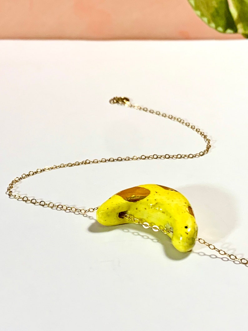 Handmade Ceramic Pendant with 18k Yellow Gold Luster on a 14k Gold Filled Chain Ceramic Bead Banana Bead Ceramic Jewelry Banana Pendant