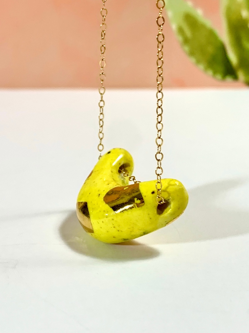 Handmade Ceramic Pendant with 18k Yellow Gold Luster on a 14k Gold Filled Chain Ceramic Bead Banana Bead Ceramic Jewelry Banana Pendant