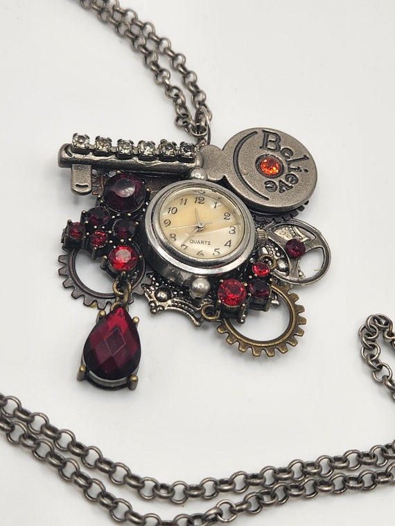 Statement assemblage necklace with vintage watch , altered key,fun gears,silver tone chain,lobster claw clasp,24". Steampunk