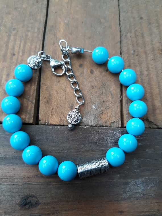 Stackable bracelet in turquoise blue and silver with a lobster claw clasp