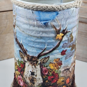 Altered tin can, it features a lovely deer, decoupaged, trimmed, storage, vase, planter