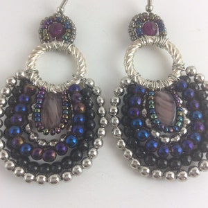 Purple and iridescent glass beads earrings, silver tone beads, silver tone rings, statement earrings