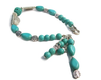 Turquoise and silver Southwest style bracelet with beaded charms