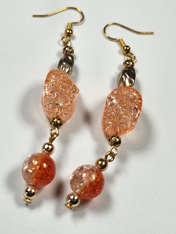 Long glittering salmon color earrings are made using vintage acrylic beads and new ear wires, 3" long, very lightweight