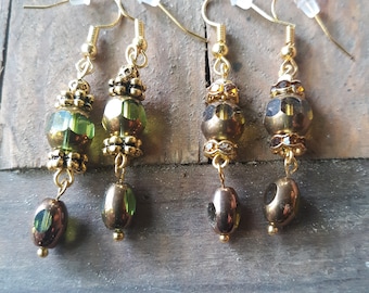 Gold color earrings with beautiful cathedral glass beads