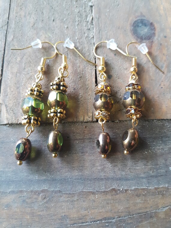Gold color earrings with beautiful cathedral glass beads