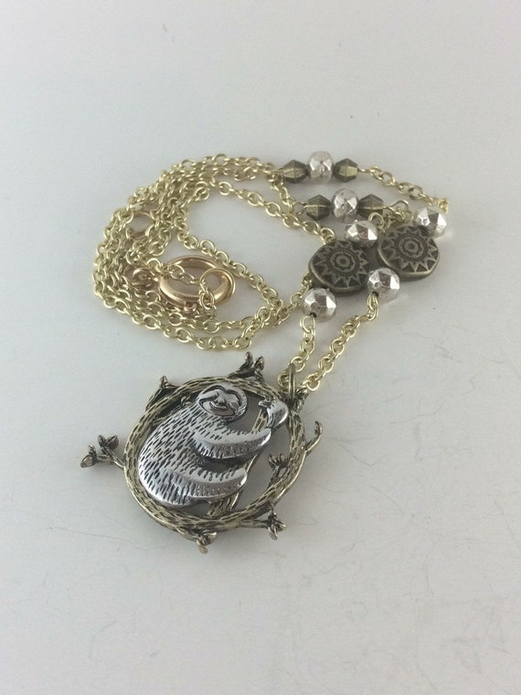Cute sloth pendant necklace in mixed metals