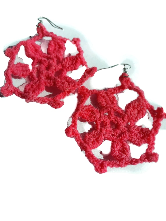Crochet earrings in coral pink, acrylic yarn and silver color ear wires