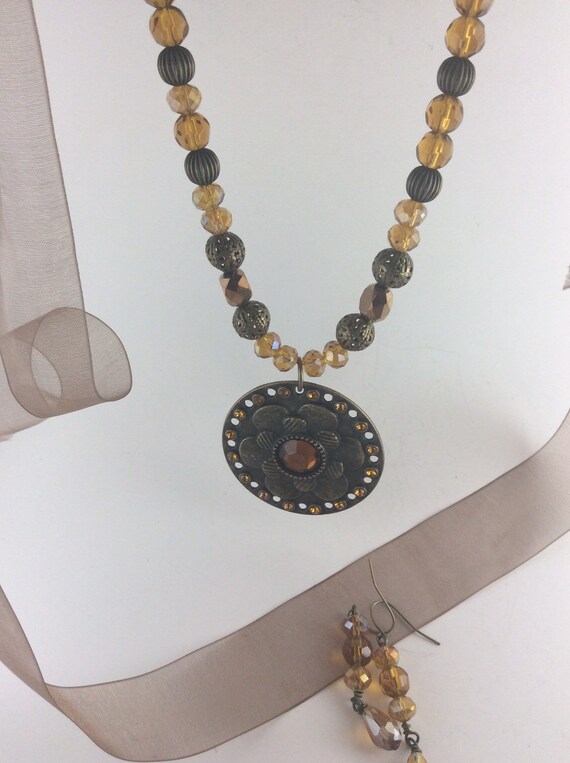 Pendant statement necklace with chiffon ribbon, metal beads, glass beads and acrylic beads