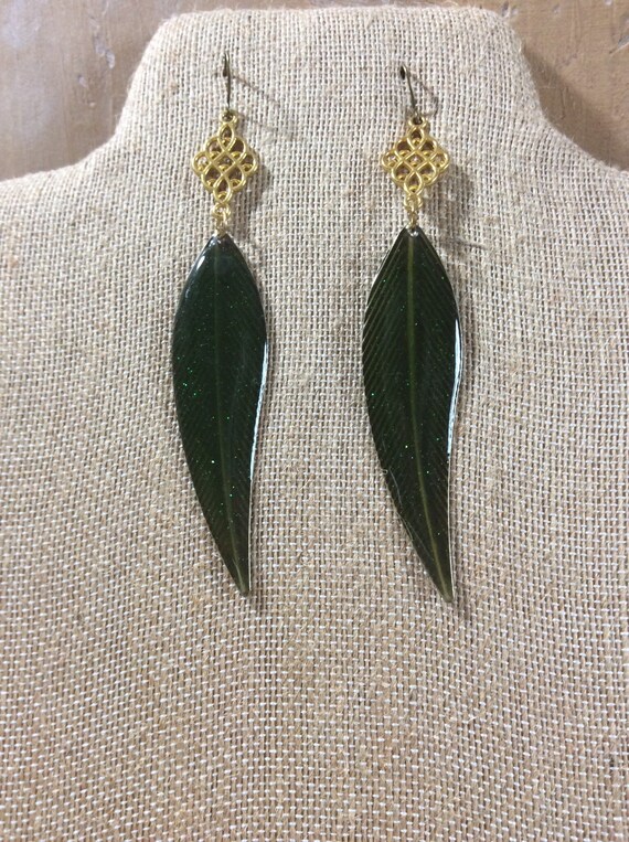 Green leaf earrings on gold tone ear wires, long dangling earrings