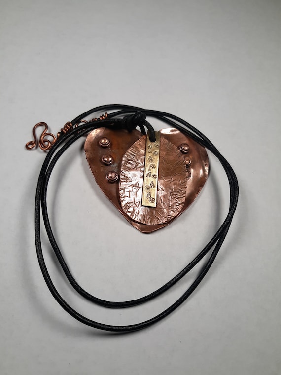 Copper heart pendant on a leather cord, Texturized heart pendant, stamped bronze bar, 7th anniversary