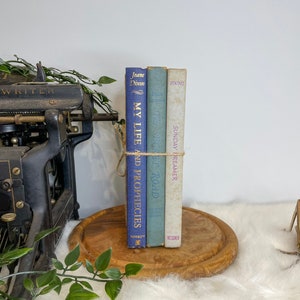 Ombré blue set of three vintage and antique books for decor purposes