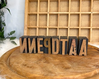 Vintage wooden letter press print type blocks