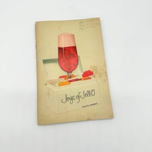 Vintage “Joys of Jello” recipe softcover cookbook.