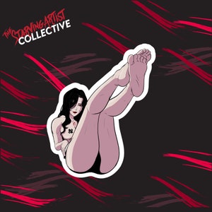 May include: A sticker featuring a woman with long black hair, wearing a black bikini bottom, with her legs raised in the air. The sticker is on a black background with red brushstrokes.