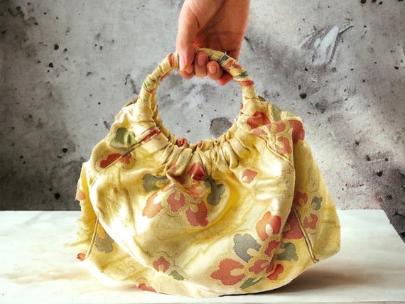 Gold ring handle bag sale