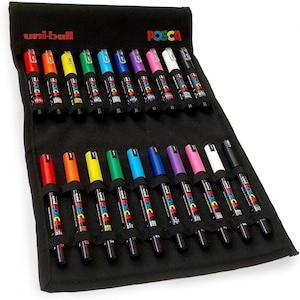 May include: A black canvas roll-up case filled with a set of Uni Posca paint markers. The markers are arranged in two rows, showcasing a vibrant spectrum of colors, including red, orange, yellow, green, blue, purple, pink, white, and black. The Uni Posca logo is visible.