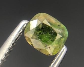 Rare  Green Phantom Axinite top cut Gemstone from Pakistan