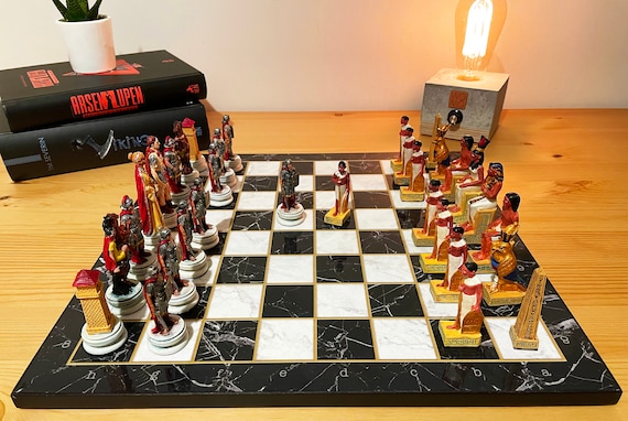 Luxury black leather and marble chess set board with roman chessmen –