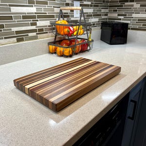 Handmade wood cutting board for chefs, home cooking, and everyday use. Perfect holiday gift