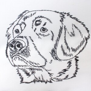 May include: A detailed black and white embroidered image of a dog's head. The dog's features, including the eyes, nose, and fur, are meticulously rendered with fine, textured lines on a white background. The artwork captures the dog's likeness.