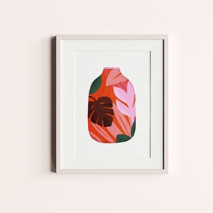 May include: A framed print of a stylised illustration of a vase with a red, pink and green floral pattern.