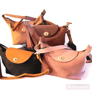 Handtasche aus Cordleder im minimalistischen Stil mit Reißverschluss und Schultergurt