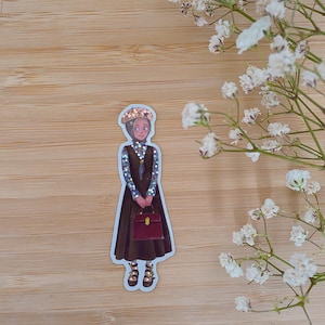 May include: A sticker of a cartoon woman wearing a brown dress, a blue and white patterned shirt, a gold crown, and brown shoes. She is holding a red briefcase.