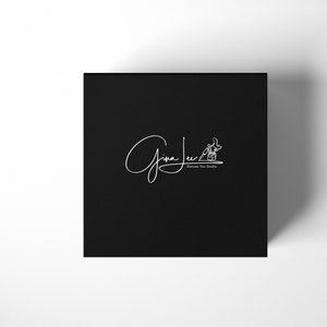 May include: Black and white logo on a black background. The logo features a handwritten signature that says "Gina Lee" and the text "Elevate You Studio".