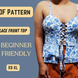 May include: A PDF pattern for a lace front top. The pattern is beginner friendly and available in sizes XS-XL. The image shows a model wearing a white top with blue floral print and a lace-up front.