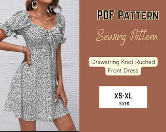 May include: PDF sewing pattern for a drawstring knot ruched front dress. The pattern includes sizes XS-XL. The dress is white with a black floral print.