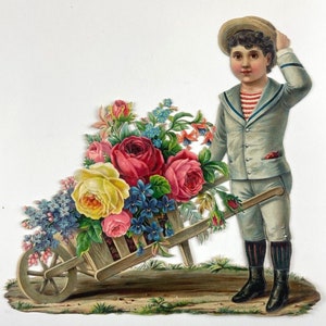 Large Vintage Victorian Die Cut Boy & Wheelbarrow Full of Flowers 8.25 x 9 Inch