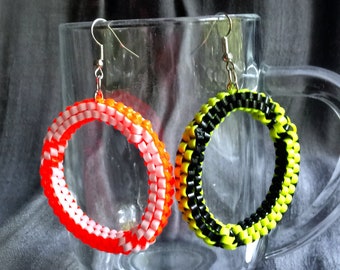 Rexlace plastic lace lanyard earrings: neon orange & yellow hoops