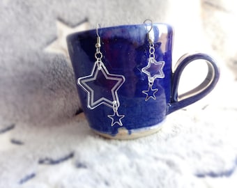 laser-cut acrylic earrings: clear dangly double stars