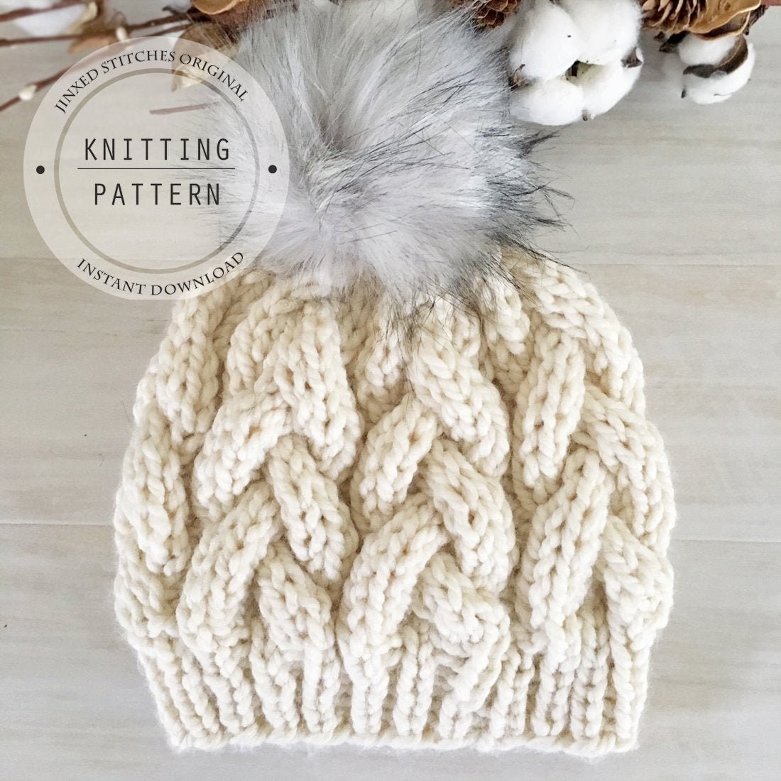 Cable knit beanie with fur pompom (+ the free knitting pattern I