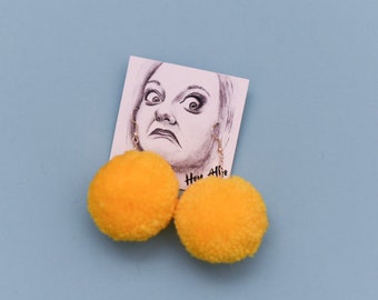 Yellow pom pom earrings