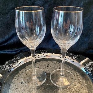 Two Rogaska crystal wine glasses with gold rims, perfect condition
