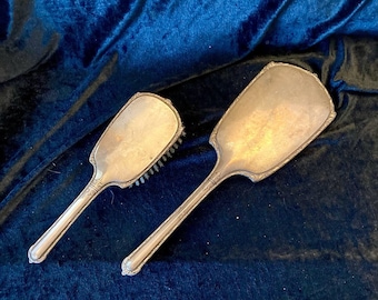 Antique Sterling silver hand mirror and hair brush